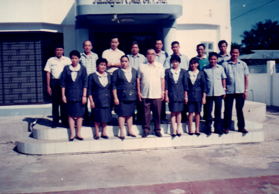 RBT Bank staff group photo in front of the Talisayan branch