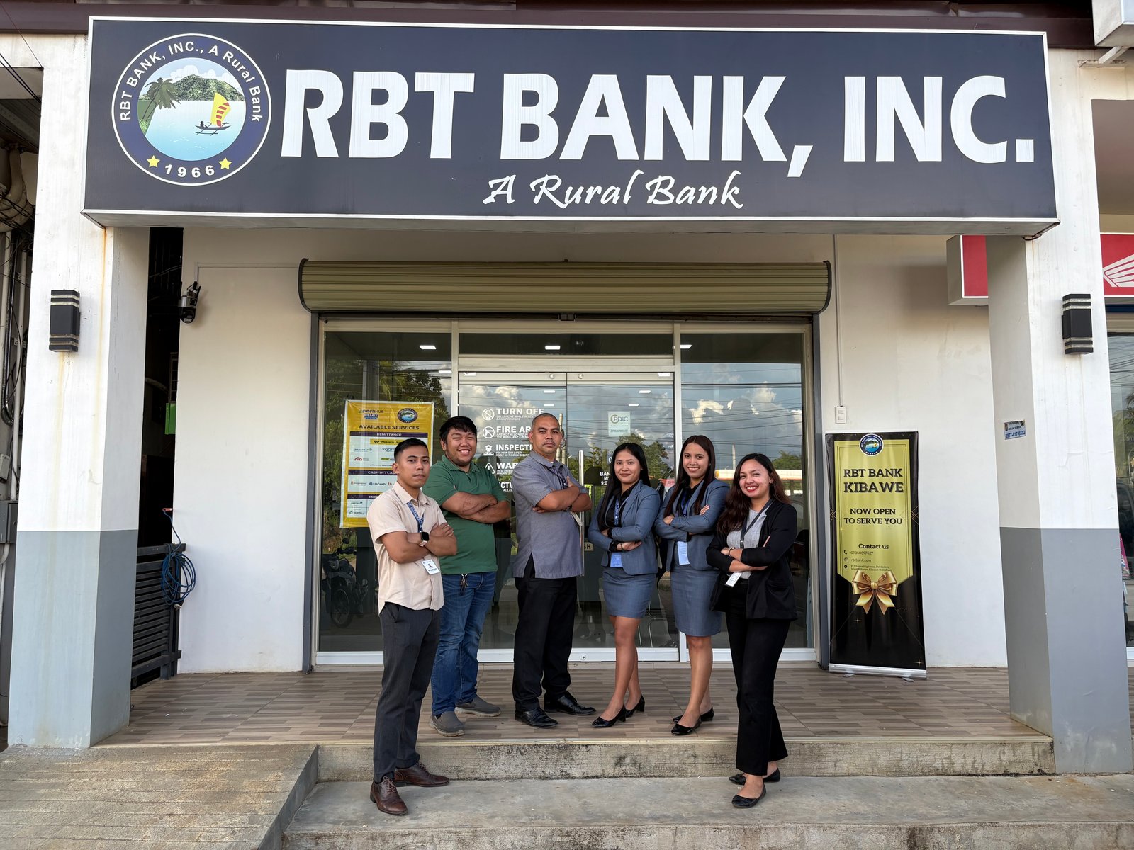 RBT Bank Inc. staff outside the newly opened Branch Lite in Kibawe, Bukidnon